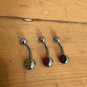 Set of Three Silver Belly Button Rings with Colorful Text